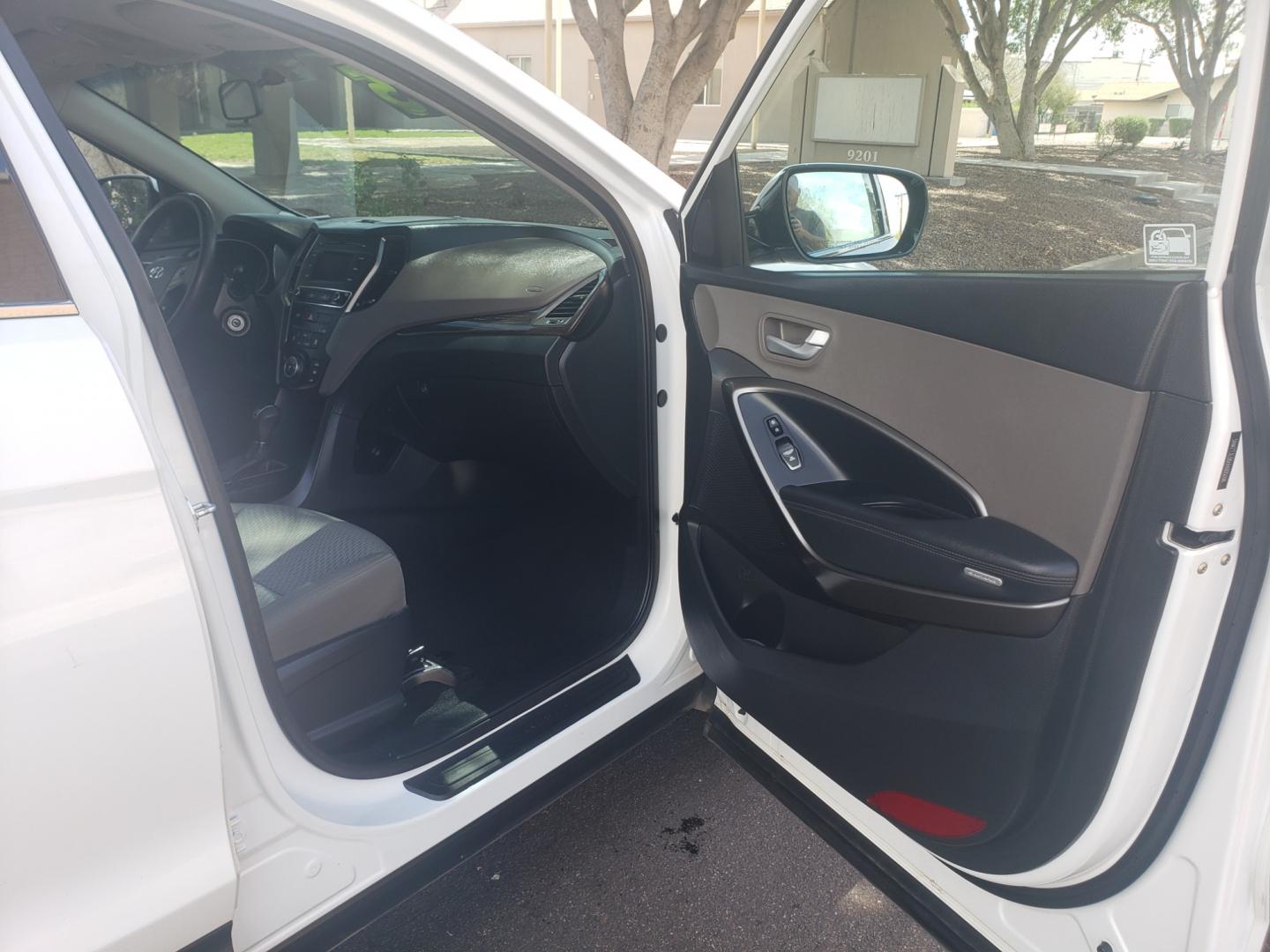 2017 WHITE /gray and black Hyundai Santa Fe SE sport (5NMZT3LB6HH) with an 2.4L L4 DOHC 16V engine, 4-Speed Automatic transmission, located at 323 E Dunlap Ave., Phoenix, AZ, 85020, (602) 331-9000, 33.567677, -112.069000 - 2017 Hyundai Santa Fe Sport,........A Must See!! No accidents, Ice cold AC. The SUV is gorgeous inside and out. Power windows, Power door locks, Touch screen Stereo/CD Player, Phone sync, Bluetooth, Backup camera, Beautiful gray and black interior with gray cloth seats in near perfect condition, Inc - Photo#12